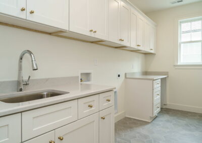 1706 Center Road by Urban Building Solutions laundry room