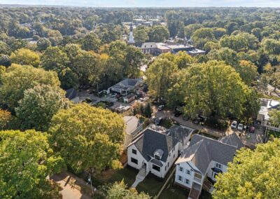 1402 Mordecai Drive by Urban Building Solutions surrounding aerial view