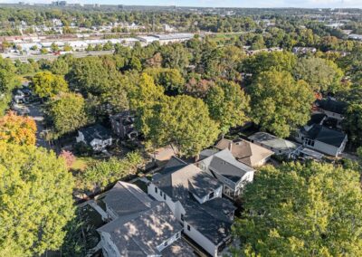 1402 Mordecai Drive by Urban Building Solutions surrounding aerial view